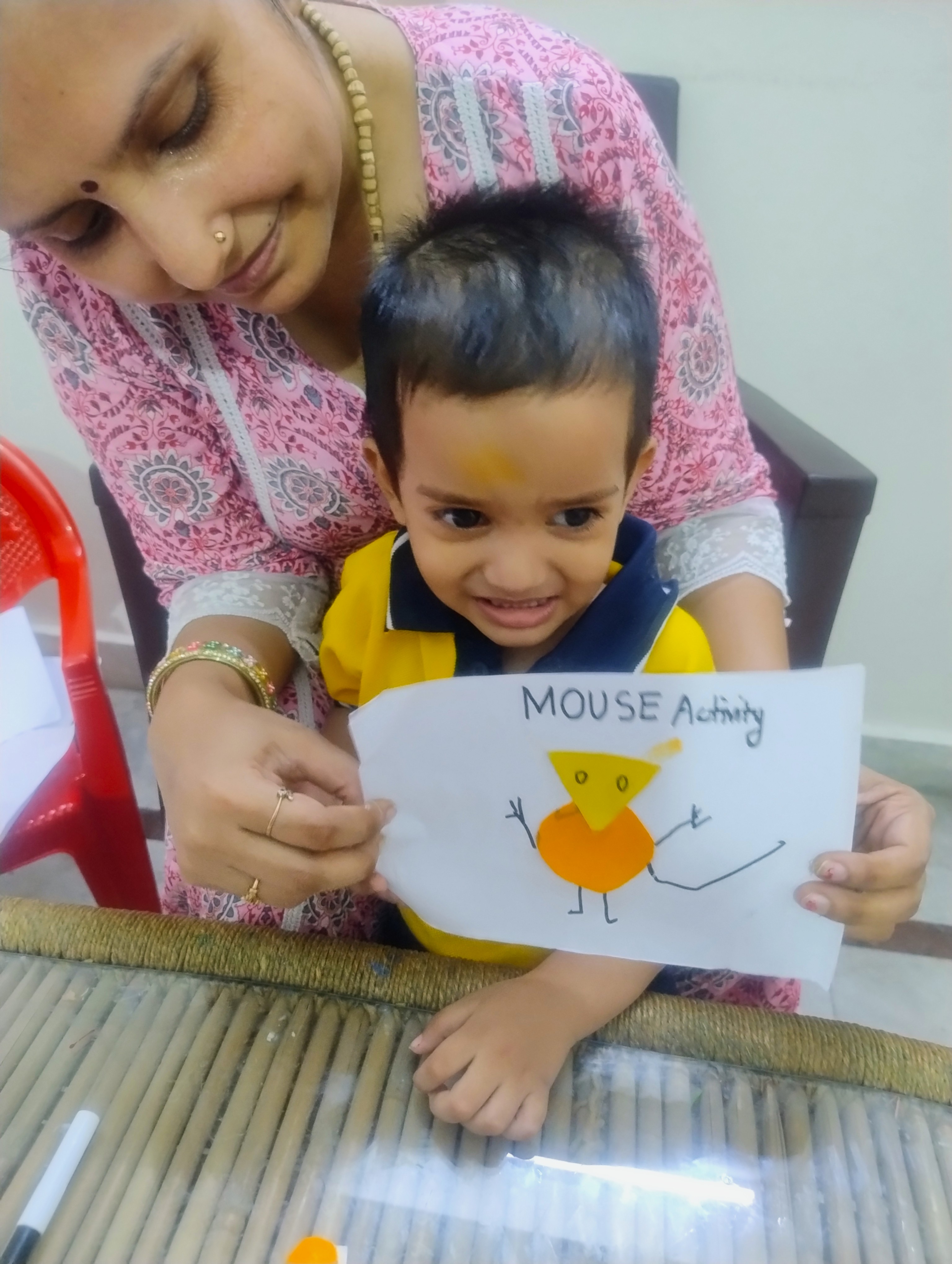 Three children engaged in a learning activity